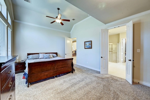 carpeted bedroom with ceiling fan, vaulted ceiling, and ornamental molding