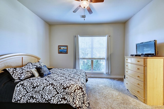 bedroom featuring ceiling fan and carpet floors