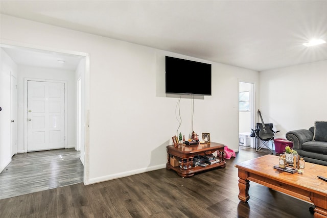 living room featuring dark hardwood / wood-style floors