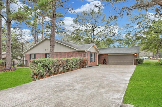 ranch-style house with a front lawn and a garage