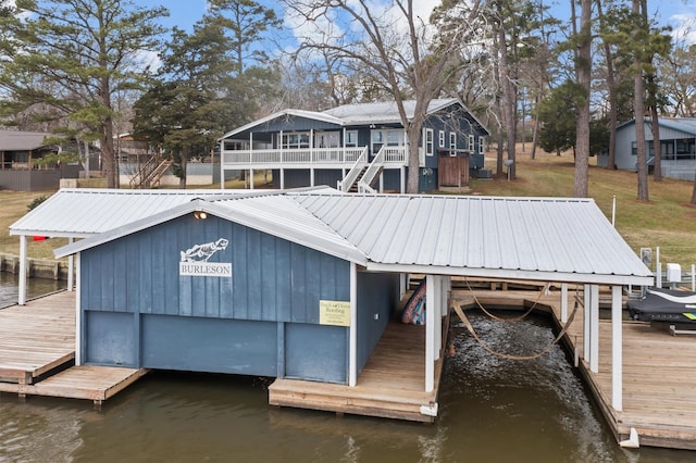 view of dock with a water view