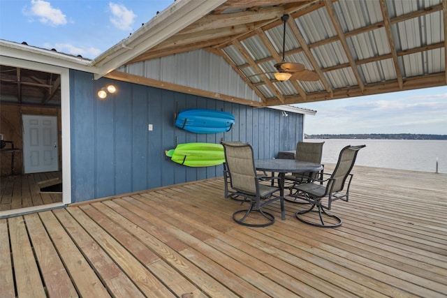 wooden deck featuring a water view