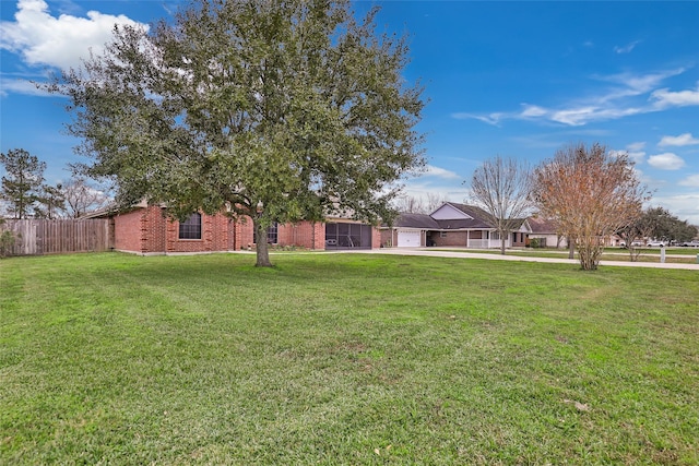 view of yard featuring a garage