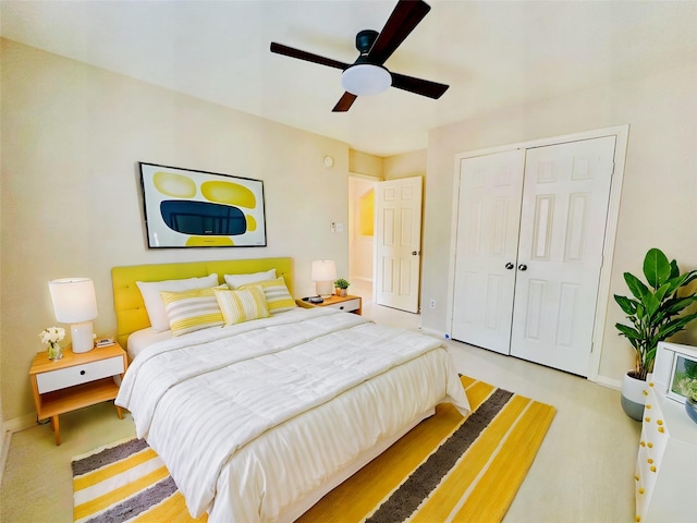 bedroom featuring a closet and ceiling fan