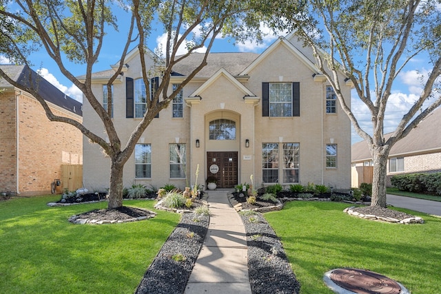 view of front of property with a front lawn