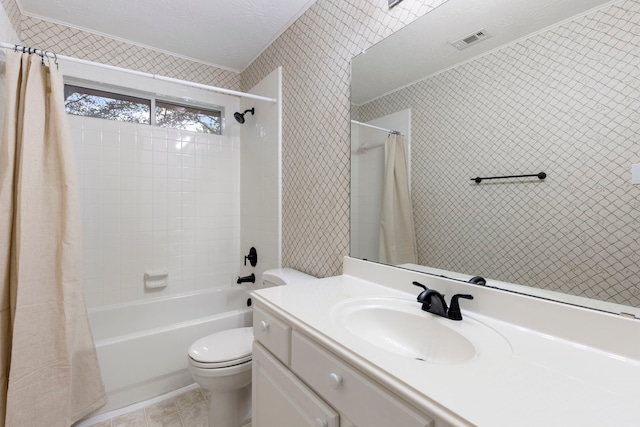 full bathroom with tile patterned floors, vanity, toilet, and shower / bathtub combination with curtain