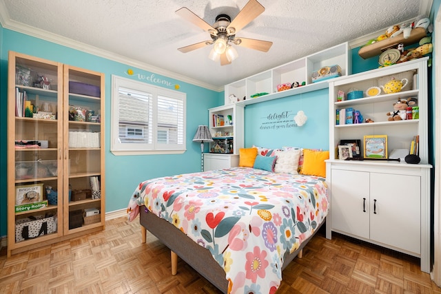 bedroom with ceiling fan, parquet floors, and a textured ceiling