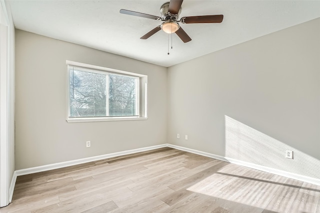 spare room with ceiling fan and light hardwood / wood-style flooring