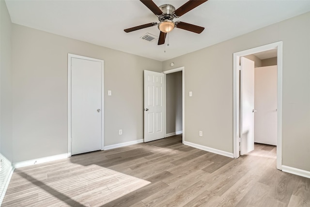 unfurnished bedroom with light hardwood / wood-style floors and ceiling fan