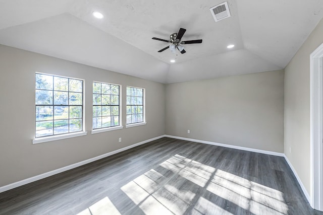 unfurnished room with lofted ceiling, ceiling fan, and dark hardwood / wood-style floors