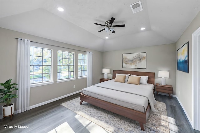 bedroom featuring lofted ceiling, ceiling fan, and dark wood-type flooring