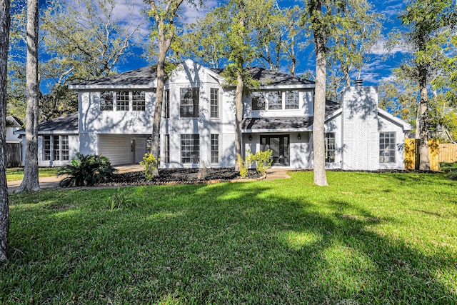 view of front of property with a front lawn