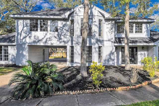 view of front of house featuring a carport