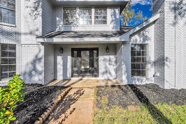 doorway to property featuring french doors