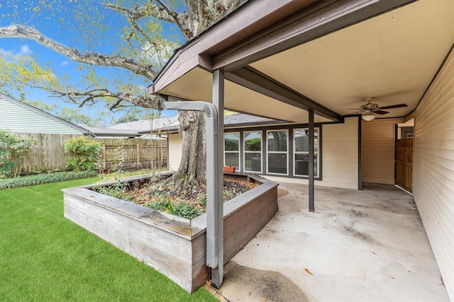 view of patio / terrace featuring ceiling fan