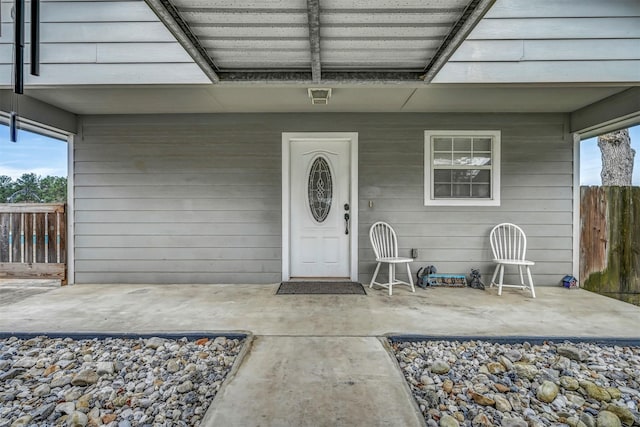 doorway to property featuring a patio area