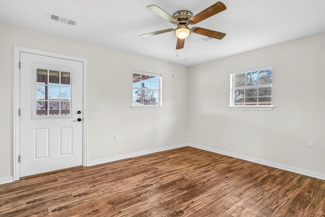 entryway with hardwood / wood-style flooring, ceiling fan, and a wealth of natural light