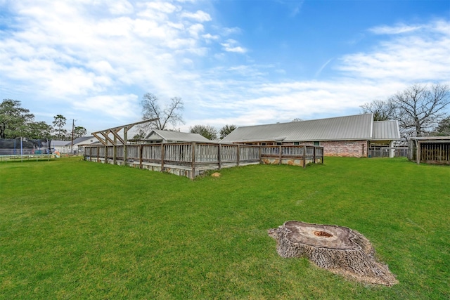 view of yard featuring a trampoline