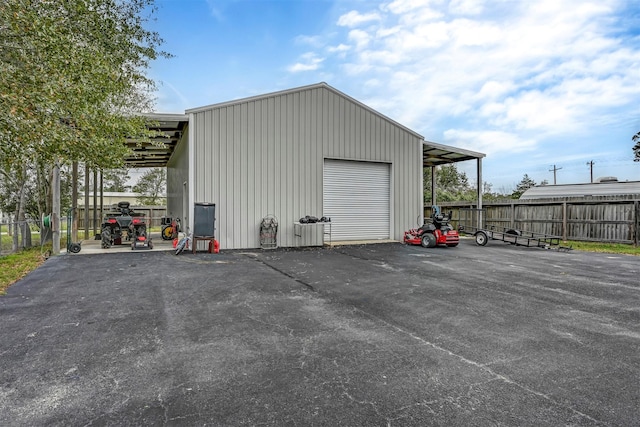 view of outbuilding with a garage