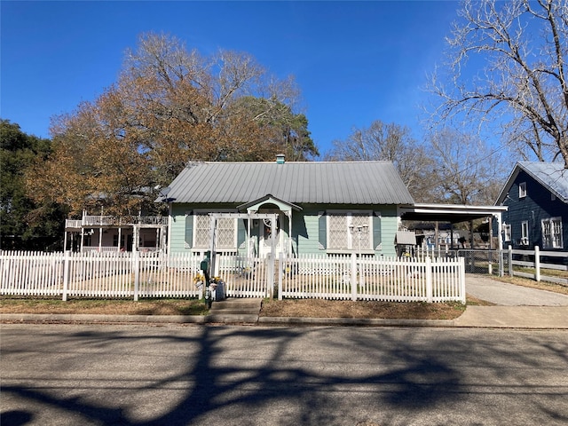 view of front of home featuring a carport