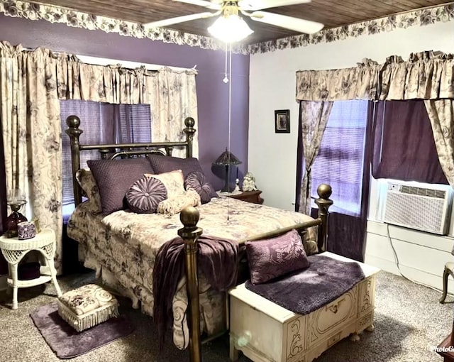 carpeted bedroom featuring ceiling fan, cooling unit, and wood ceiling