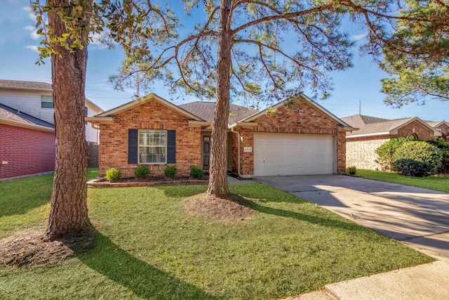 ranch-style house featuring a garage and a front lawn