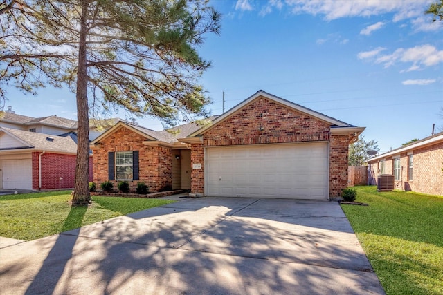 ranch-style house with a front yard, central AC, and a garage