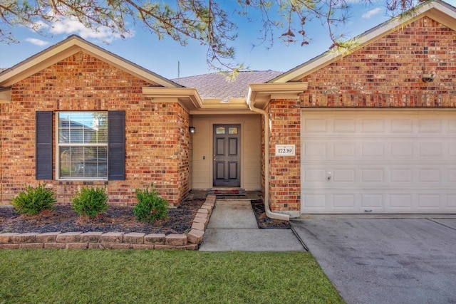 single story home featuring a garage