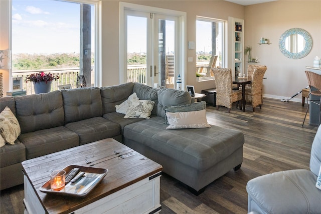 living room with dark hardwood / wood-style floors