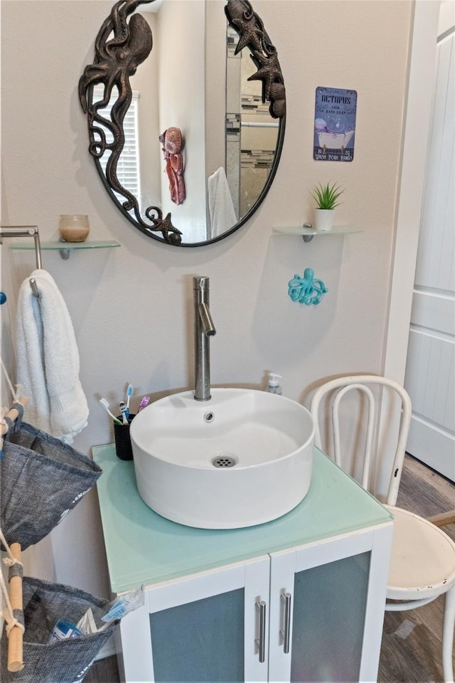 bathroom featuring vanity and hardwood / wood-style flooring