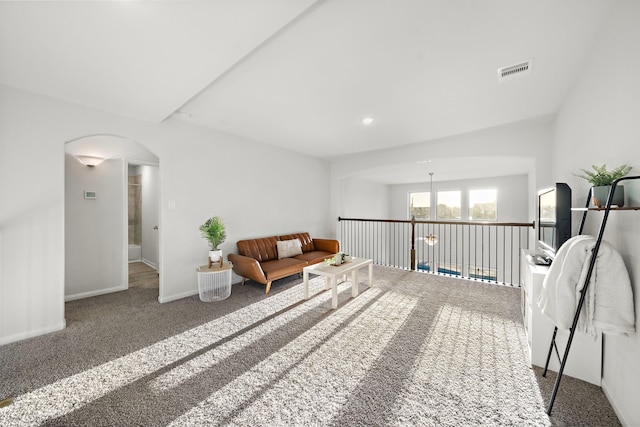 living area featuring carpet floors