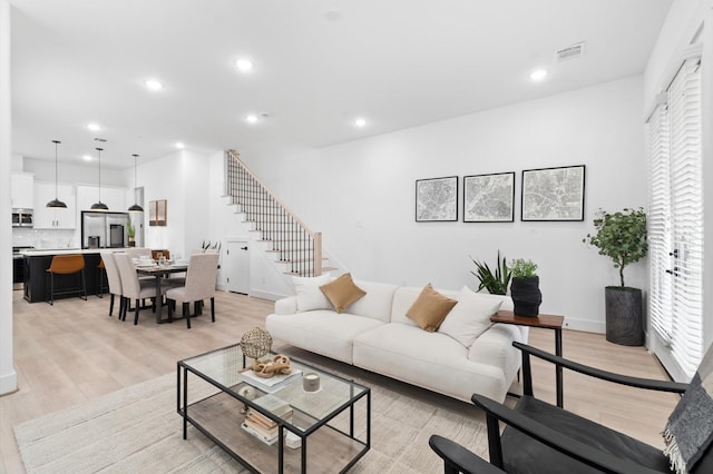 living room featuring light hardwood / wood-style floors