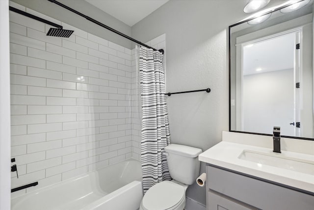 full bathroom with shower / tub combo, vanity, and toilet