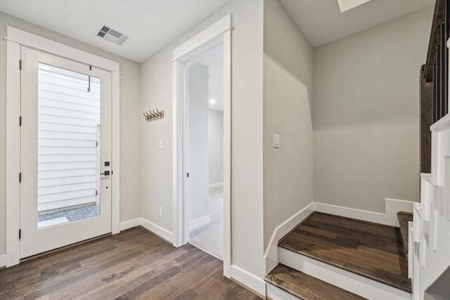 entrance foyer featuring dark hardwood / wood-style flooring