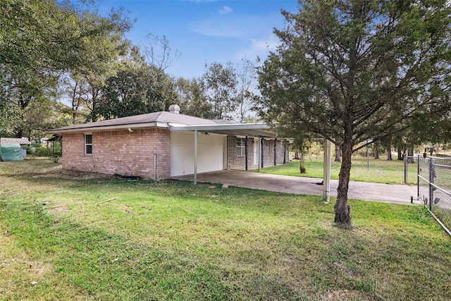 ranch-style house with a front yard and a carport