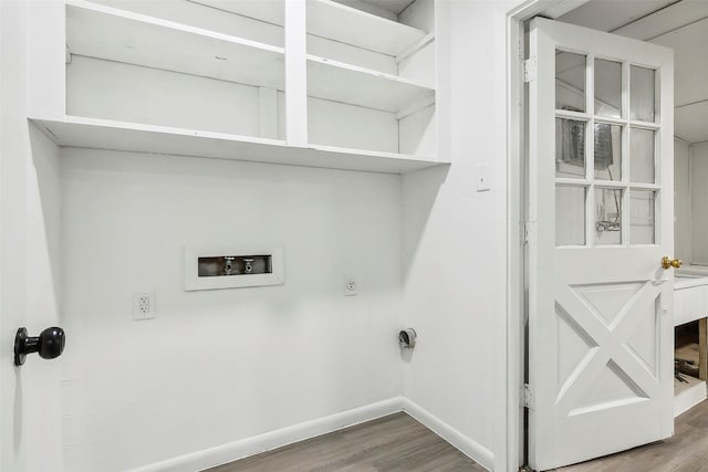 washroom featuring hardwood / wood-style floors, hookup for a washing machine, and electric dryer hookup