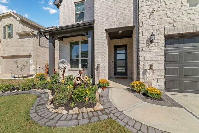 doorway to property featuring a garage