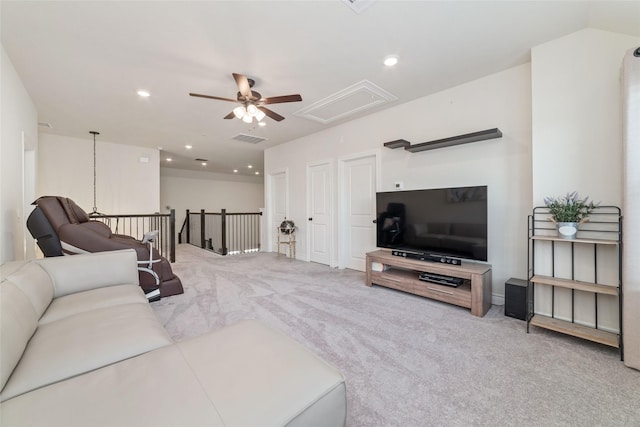 living room with light colored carpet and ceiling fan