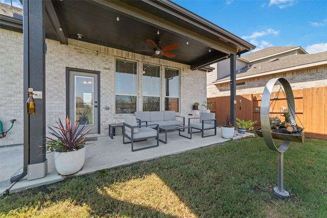 view of patio with outdoor lounge area and ceiling fan