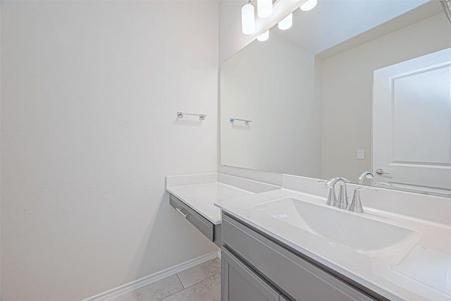 bathroom with tile patterned flooring and vanity