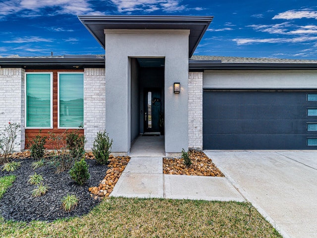 property entrance with a garage