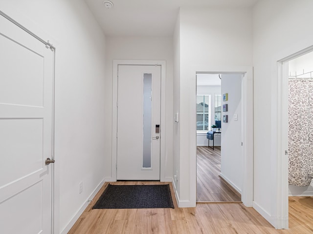 foyer entrance featuring light wood-type flooring