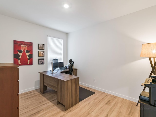 home office featuring light hardwood / wood-style floors