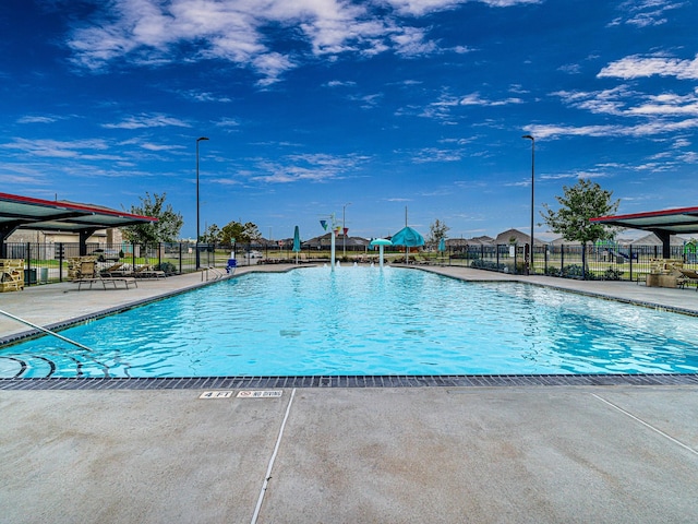 view of swimming pool featuring a patio