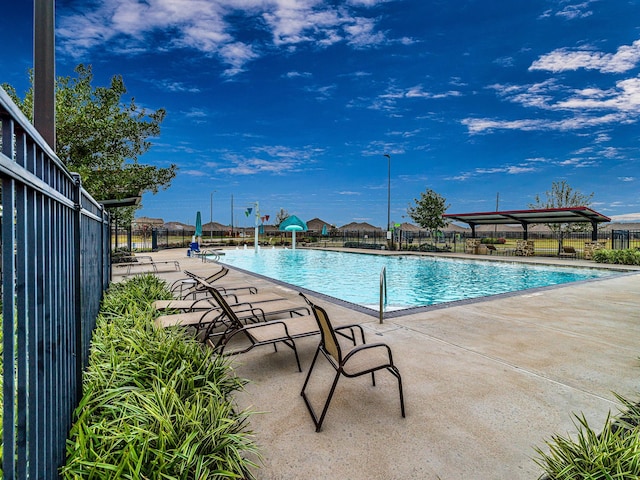 view of pool with a patio area