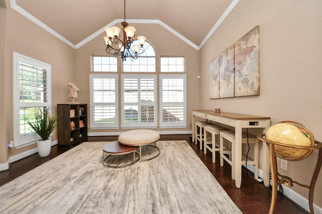 sitting room with a healthy amount of sunlight, ornamental molding, dark hardwood / wood-style flooring, and vaulted ceiling