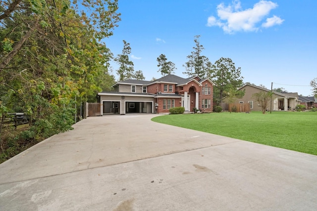 view of front facade with a front lawn and a garage