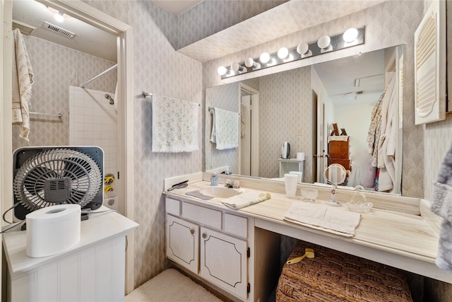 bathroom with vanity and shower / bathtub combination with curtain