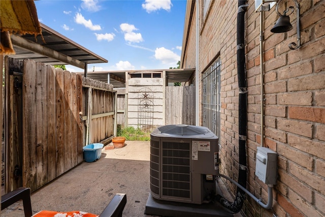 exterior details featuring central AC