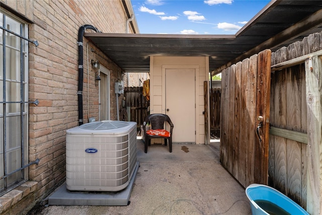 view of patio with central AC unit